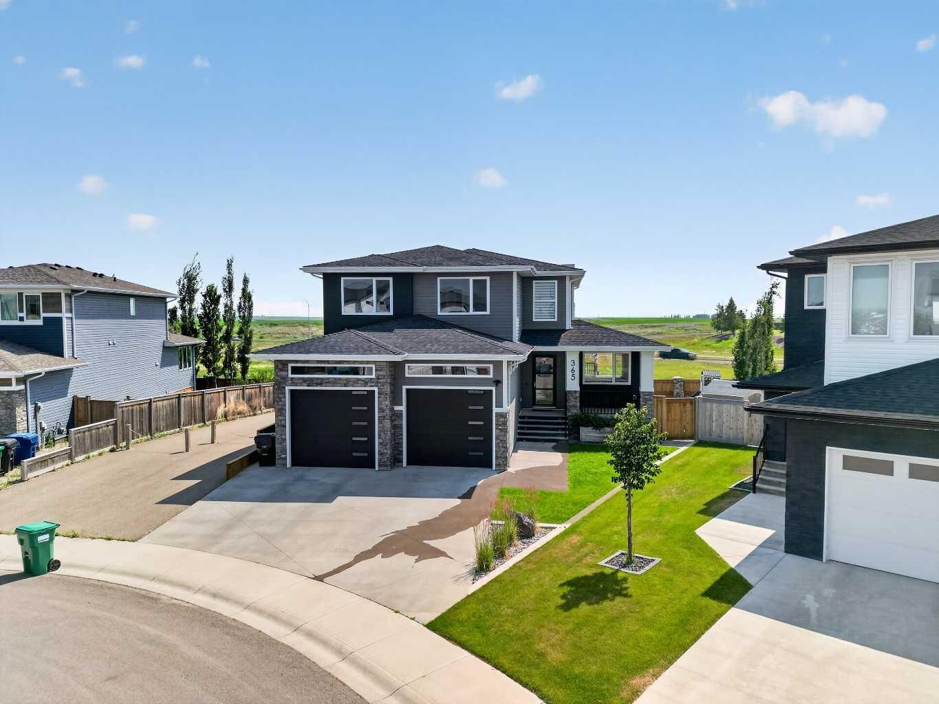 Property Photo:  365 Rivergrove Chase W  AB T1K 8E9 