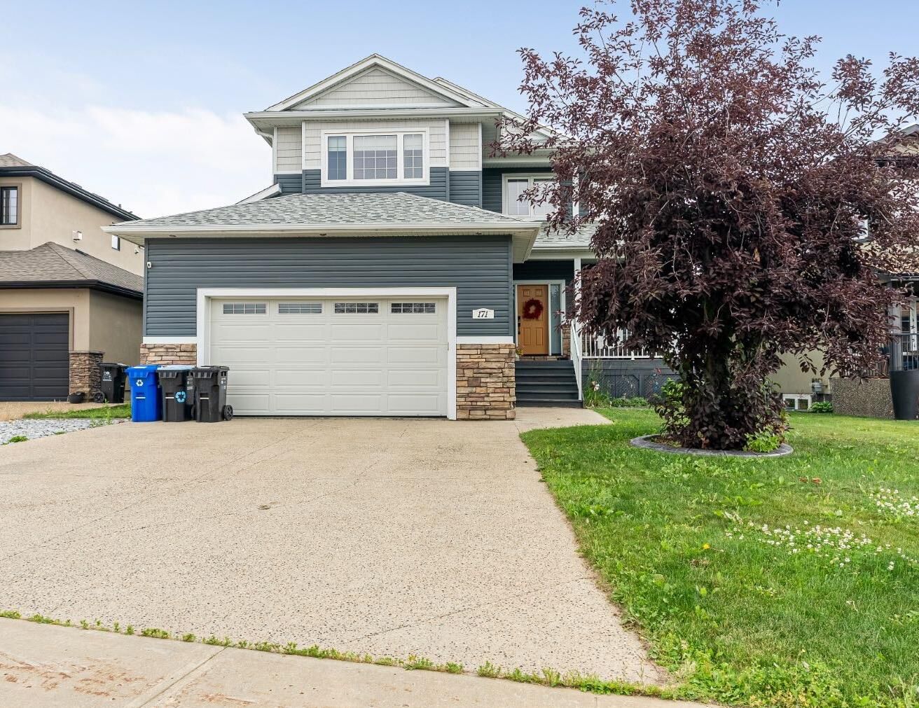 Property Photo:  171 Wild Rose Street  AB T9K 0G8 