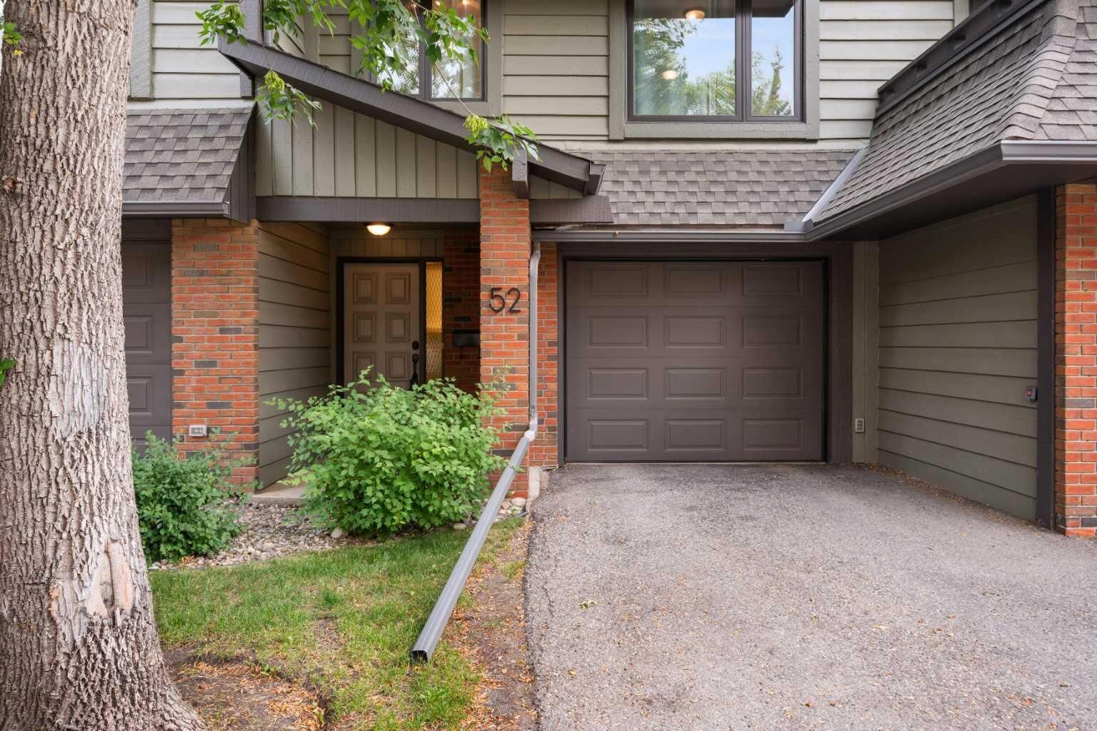 Property Photo:  10030 Oakmoor Way SW 52  AB T2V 4S8 