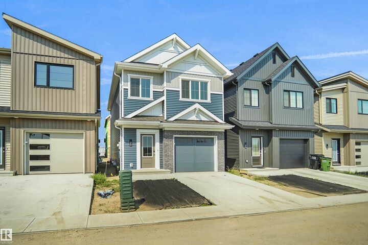 Property Photo: 1430 Aster Way NW 28 AB T6T 2X5
