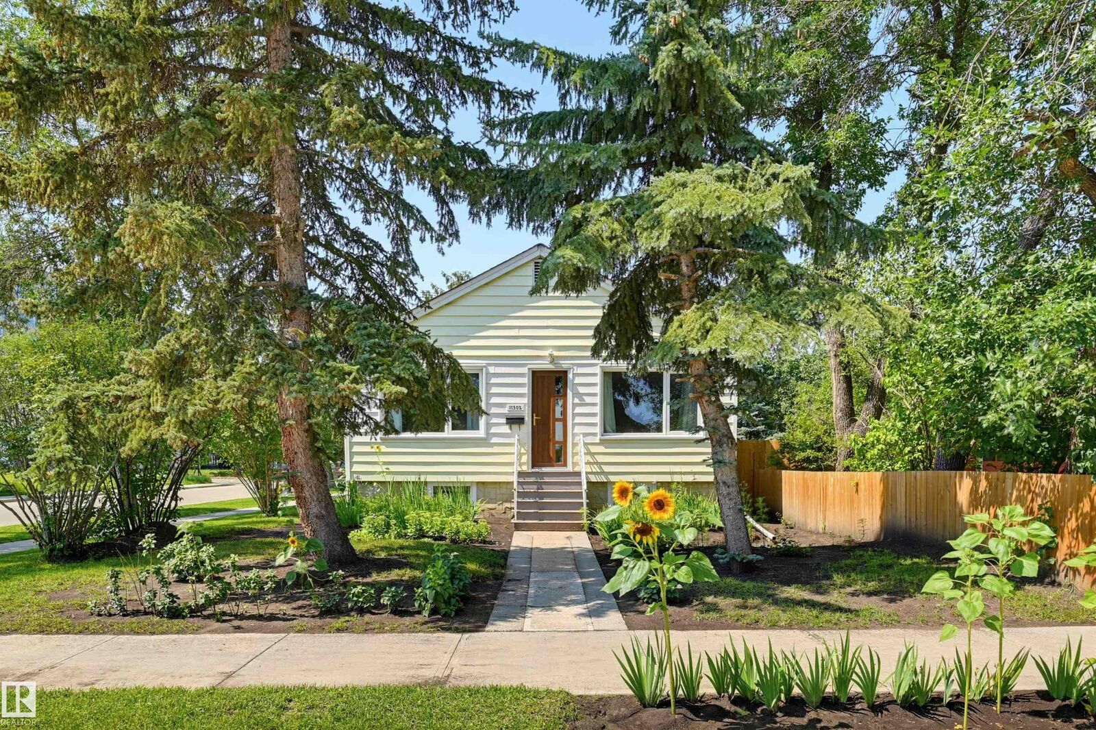 Property Photo:  11502 127 Street NW  AB T5M 0V3 
