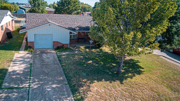 Property Photo: 1406 W Mississippi Avenue OK 73018