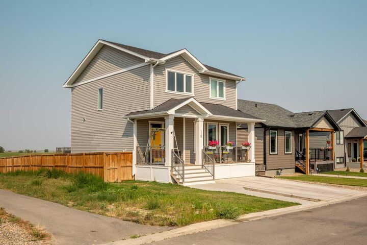 Property Photo: 110 Prairie Gold Street AB T1G 0G3