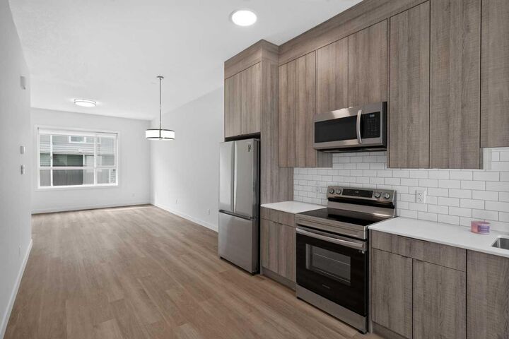 Property Photo: 101 Panatella Square NW 202 AB T3K 2R9