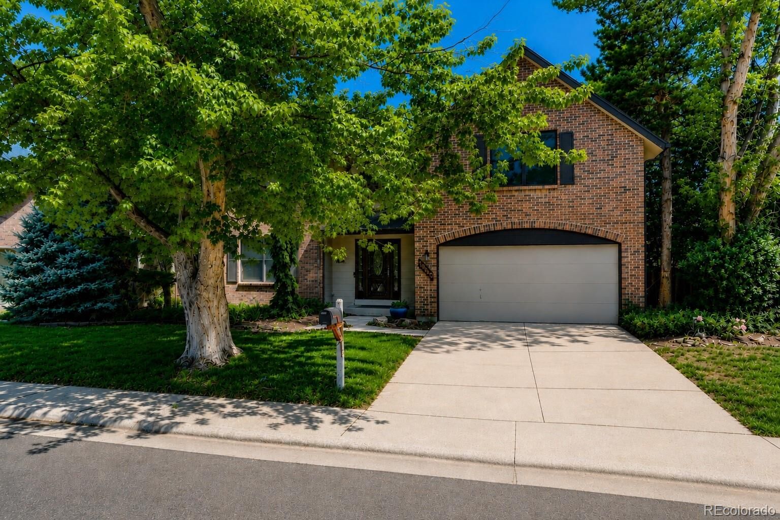 Property Photo: 12341 E Vassar Drive CO 80014
