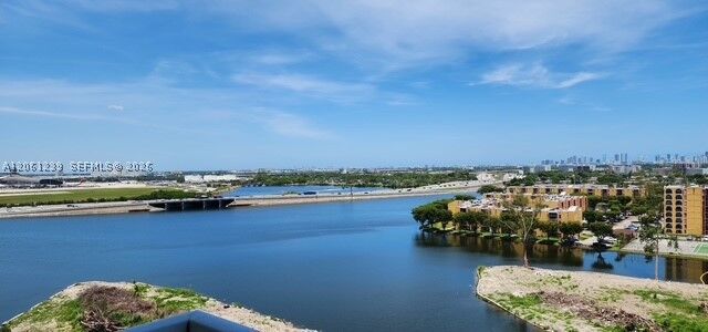 Property Photo:  5077 NW 7 1211  FL 33126 