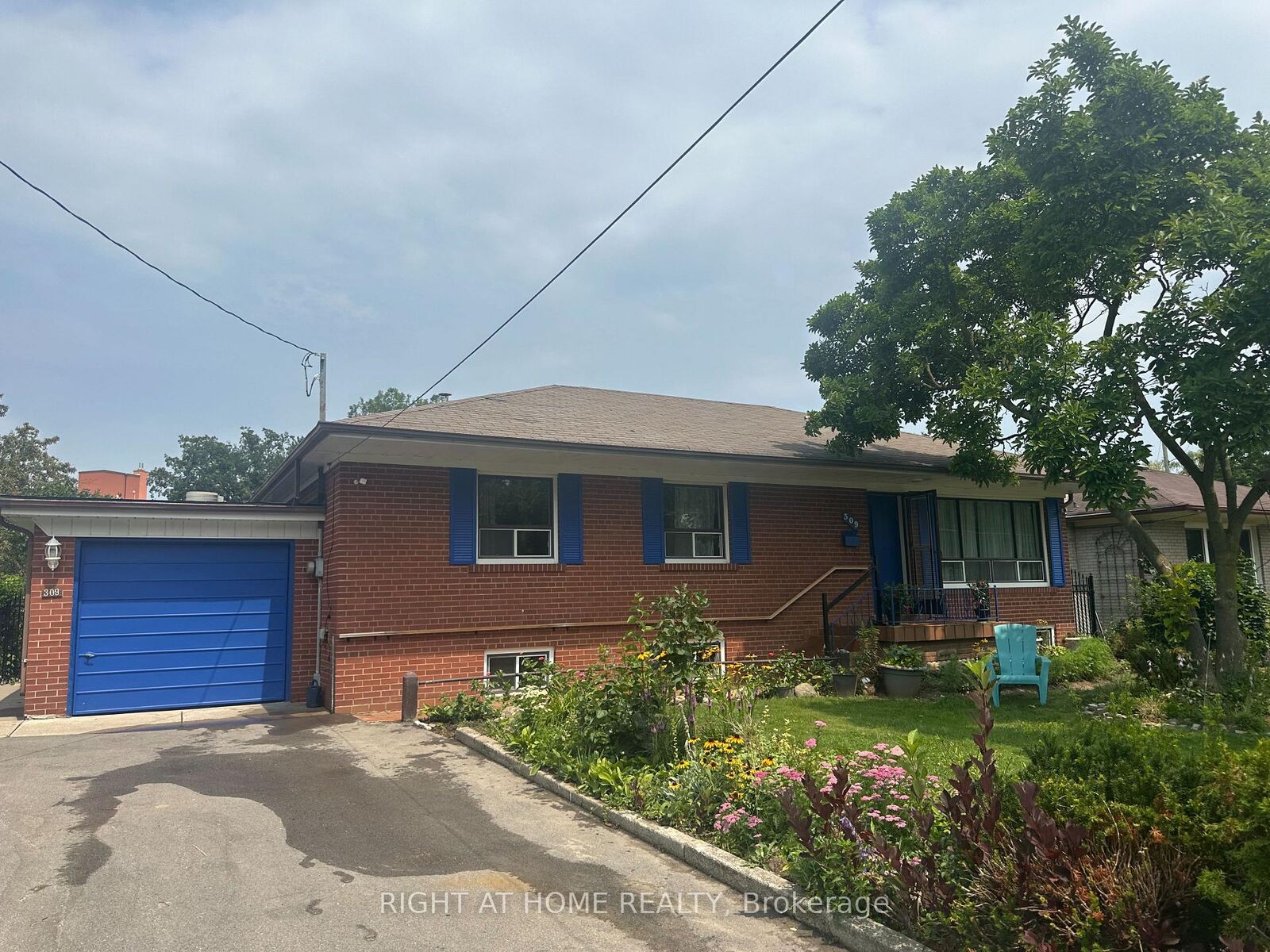 Property Photo: 309 Queen Mary Drive ON L6K 3L5