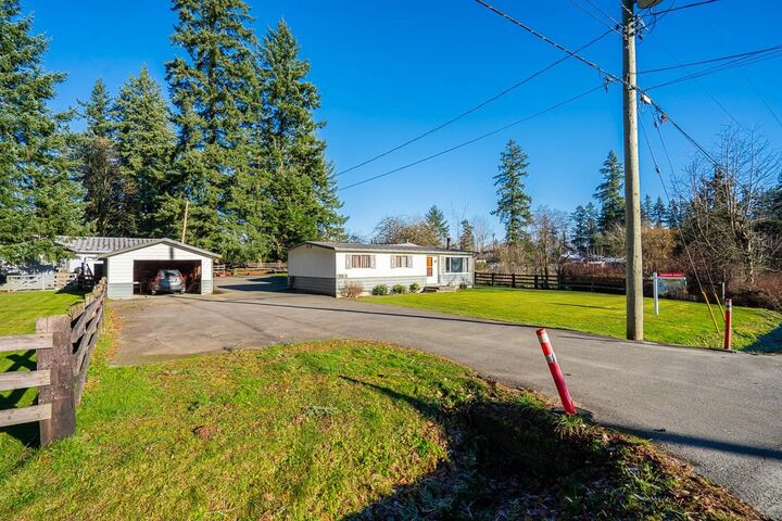 Property Photo: 26267 64 Avenue BC V4W 1M3
