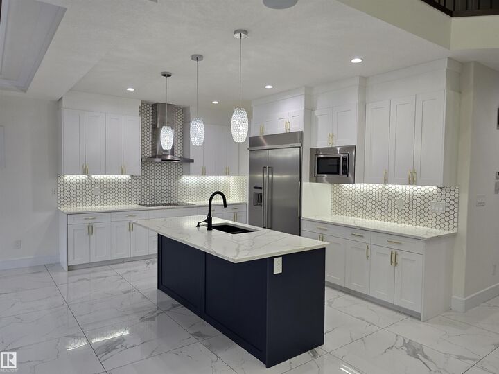 Property Photo: 228 36 Street SW AB T6X 2W5
