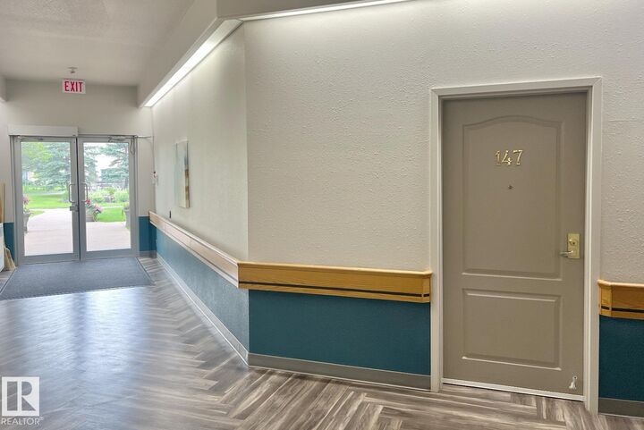 Property Photo: 13441 127 Street NW 147 AB T5J 6B6