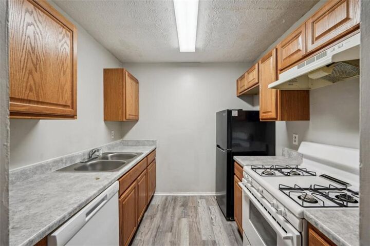 Property Photo:  703 Pine Tree Trail  GA 30349 