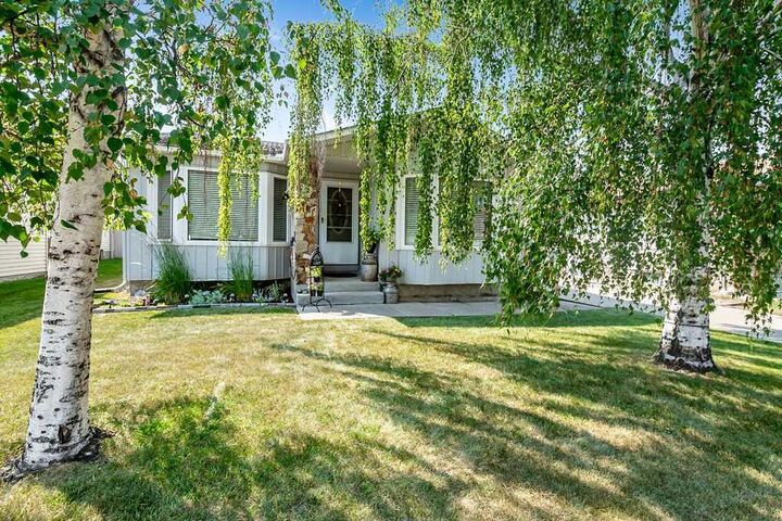 Property Photo: 163 Woodburn Crescent AB T1S 1L4