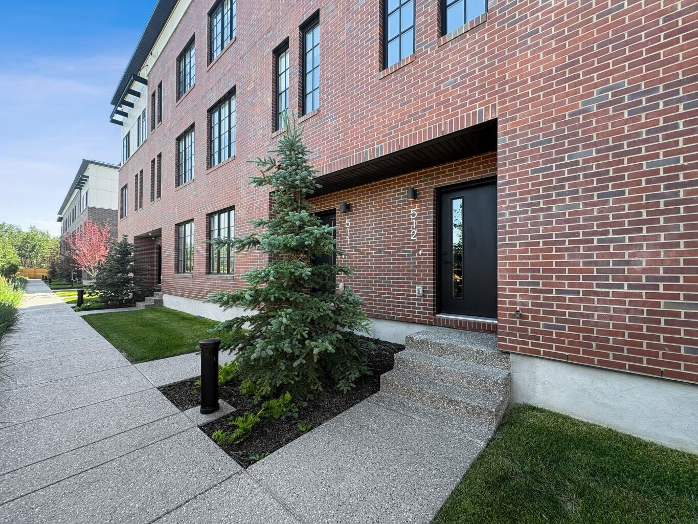 Property Photo: 8155 8 Avenue SW 512 AB T3H 6B1