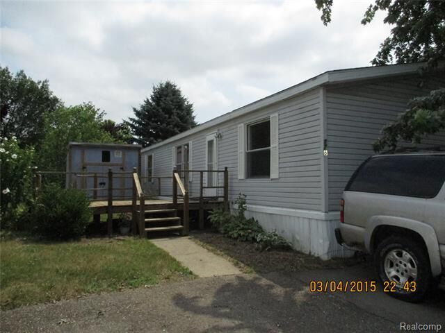 Property Photo:  6988 McKean 176  MI 48197 