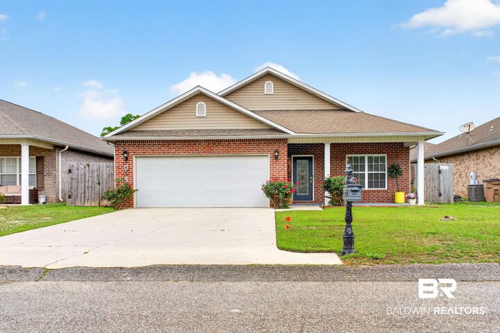 Property Photo: 7900 Park Place Dr S AL 36608