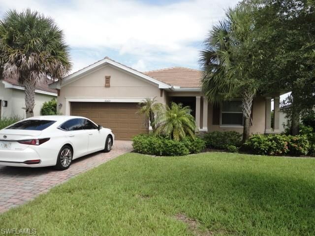 Property Photo: 16023 Mistflower Dr FL 33920