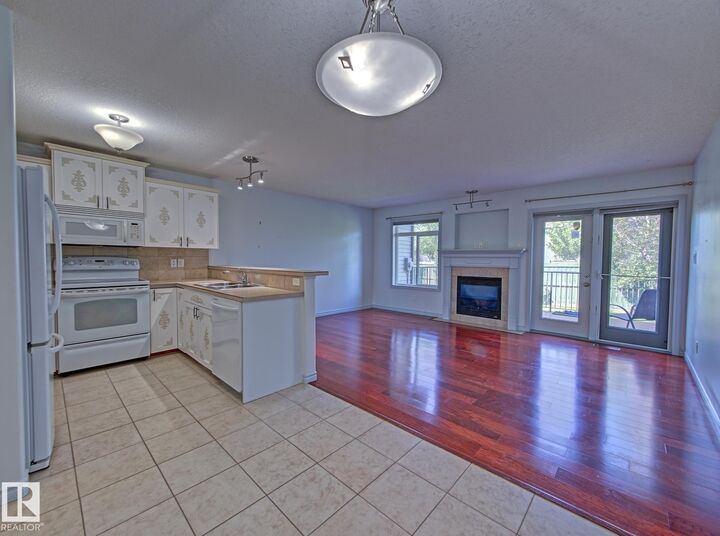 Property Photo: 10 Woodcrest Lane 3 AB T8L 4R8