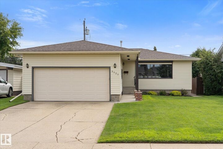 Property Photo: 8727 73 Street NW AB T6B 1Z9