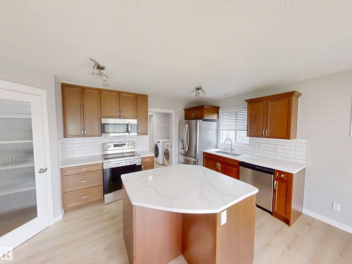 Property Photo: 21107 58 Avenue NW AB T6M 0H3