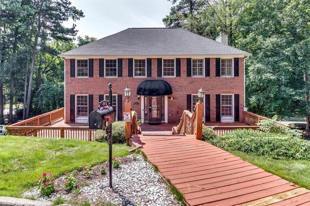 Property Photo:  6963 Whispering Oaks Court  GA 30087 