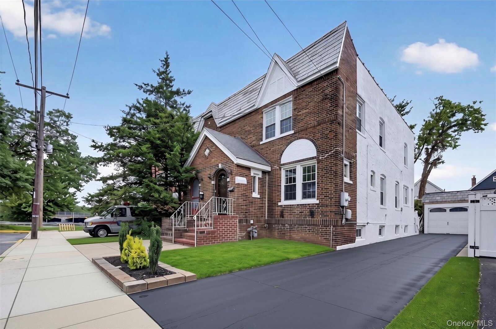 Property Photo:  94-45 243rd Street  NY 11001 