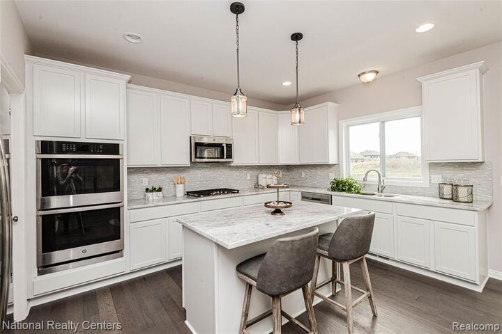 Property Photo: 37 Valley Creek Drive MI 48438