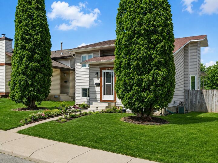 Property Photo: 203 Shawglen Road SW AB T2Y 1Y2