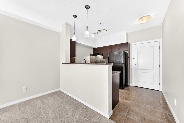 Property Photo:  604 East Lake Boulevard NE 1308  AB T4A 0G6 