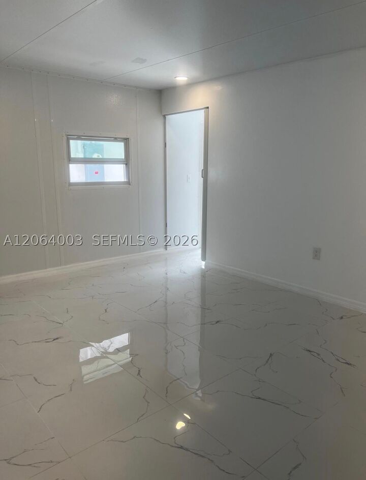 Property Photo:  9625 NW 36th Ave Rear B  FL 33147 