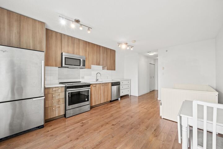 Property Photo: 13325 102A Avenue 2511 BC V3T 0J5