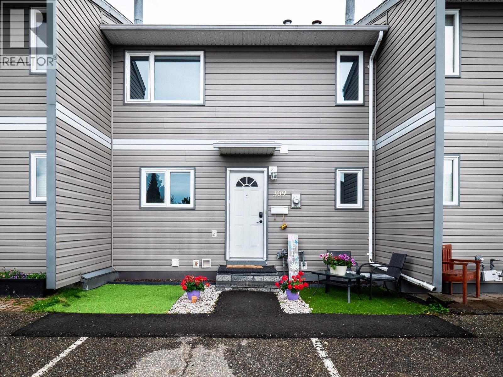 Property Photo:  2550 Ospika Boulevard 309  BC V2N 3T2 