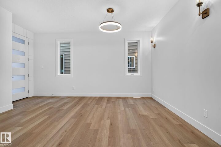 Property Photo: 15728 9 Street NE AB T5Y 4N1