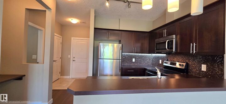 Property Photo: 2584 Anderson Way NW 409 AB T6W 0R2
