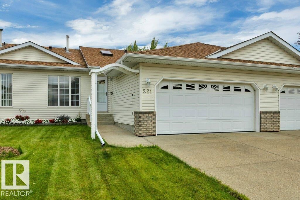Property Photo: 221 Ravine Villa(S) AB T9E 8B9