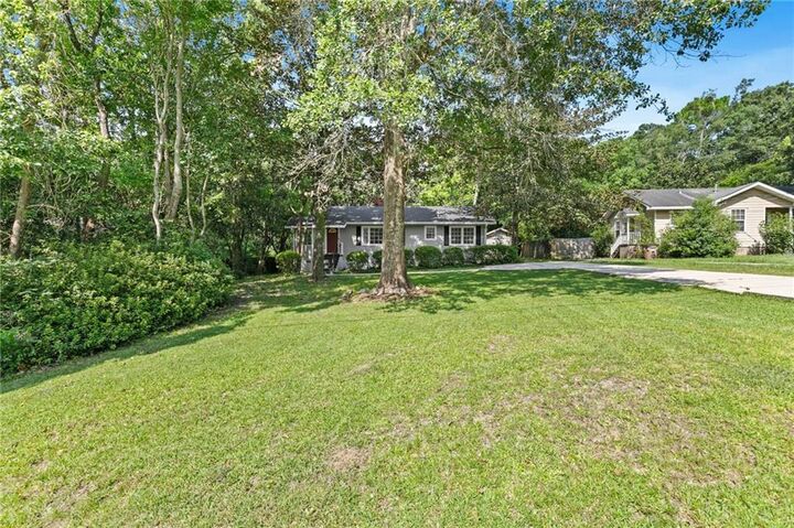 Property Photo: 1009 Pinewood Drive AL 36618