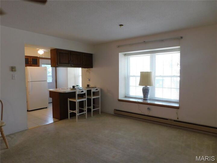 Property Photo:  1673 Herault Place F  MO 63125 