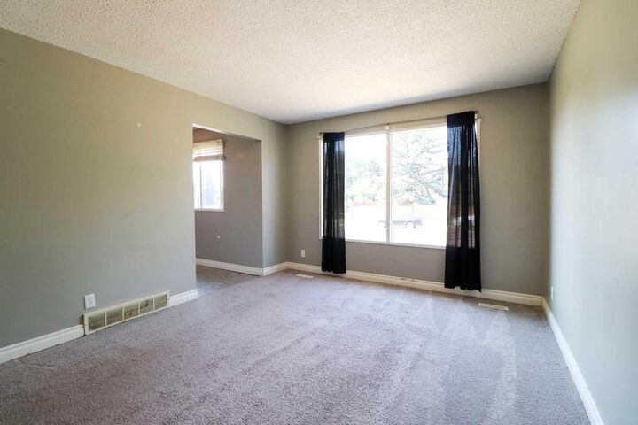 Property Photo: 71 Laval Boulevard W AB T1K 4E1