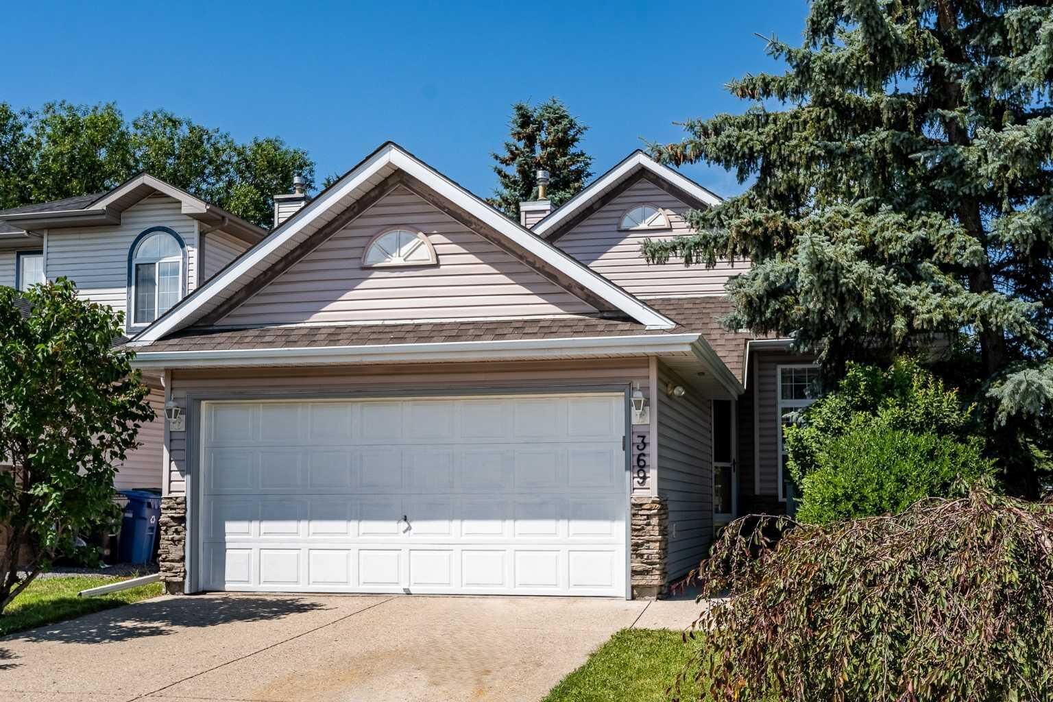 Property Photo:  369 Hidden Valley Place NW  AB T3A 5L7 