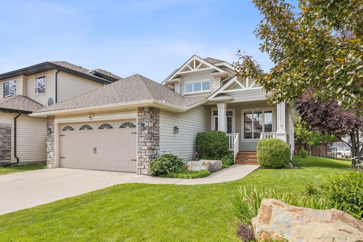 Property Photo: 48 Rockywood Circle NW AB T3G 5W2