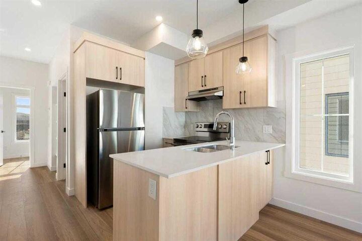 Property Photo: 156 Park Street 407 AB T4C 3H3