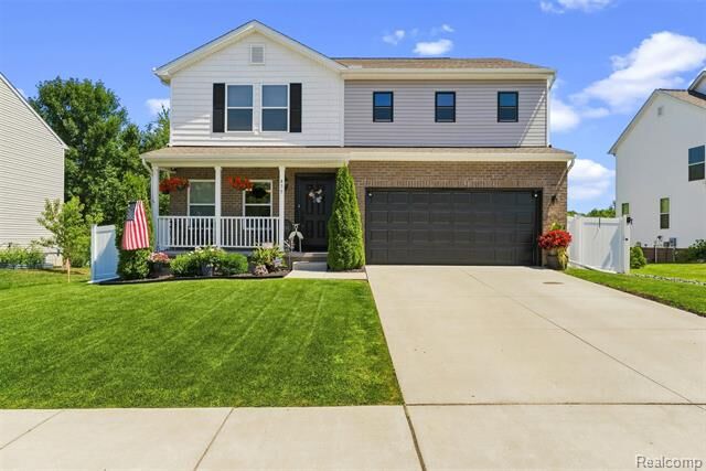Property Photo:  435 Old Farm Lane  MI 48446 