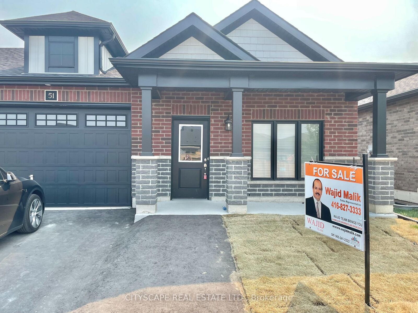 Property Photo: 51 Waterthrush Lane ON N3Y 0E9