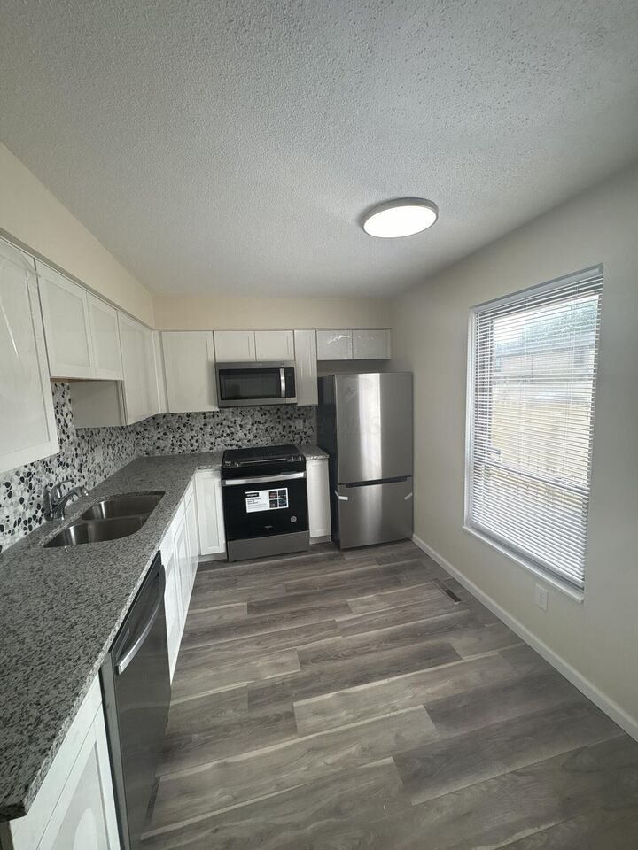 Property Photo:  1599 McNaughten Road  OH 43232 