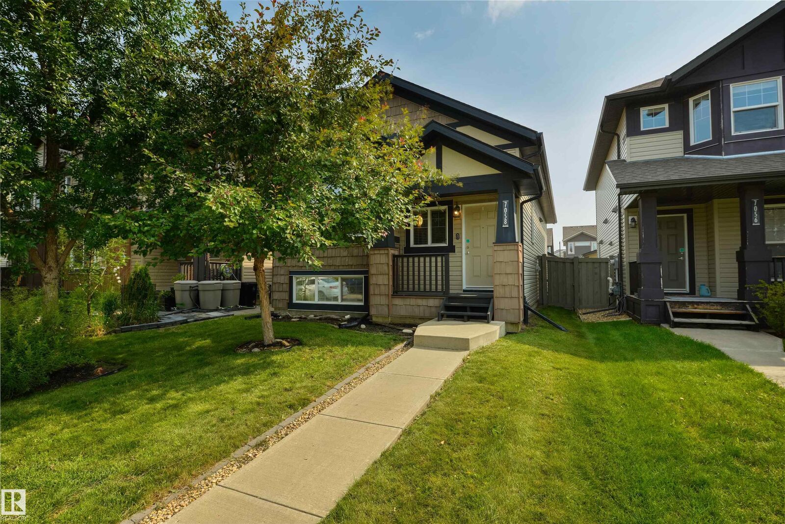 Property Photo: 7058 Cardinal Way SW AB T6W 1Z2