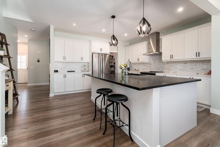 Property Photo: 1450 Darby Green SW AB T6W 4N5