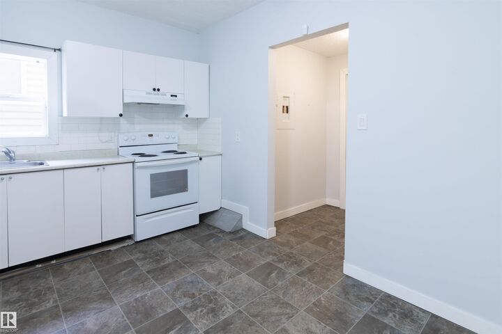 Property Photo:  11029 95 Street NW  AB T5H 2E9 