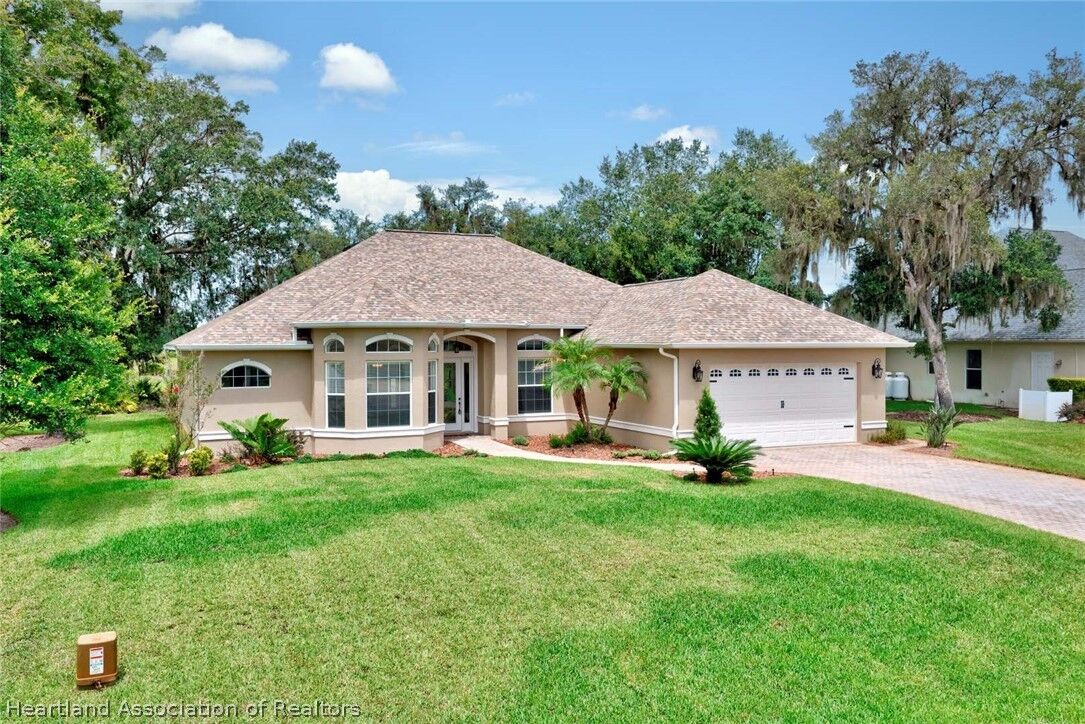 Property Photo: 3878 Enchanted Oaks Lane FL 33875