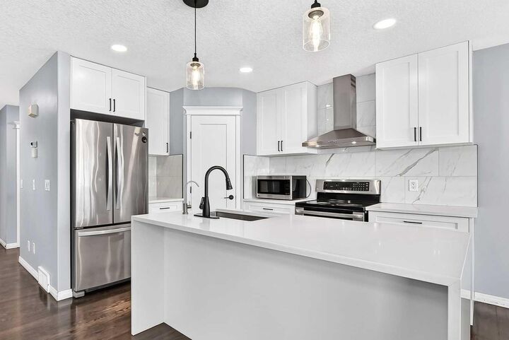 Property Photo: 12871 Coventry Hills Way NE AB T3K 5L4