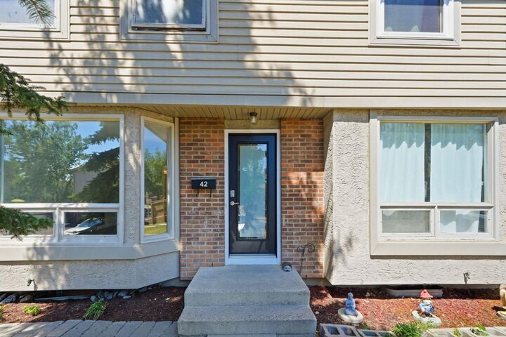 Property Photo: 123 Queensland Drive SE 42 AB T2J 5J4