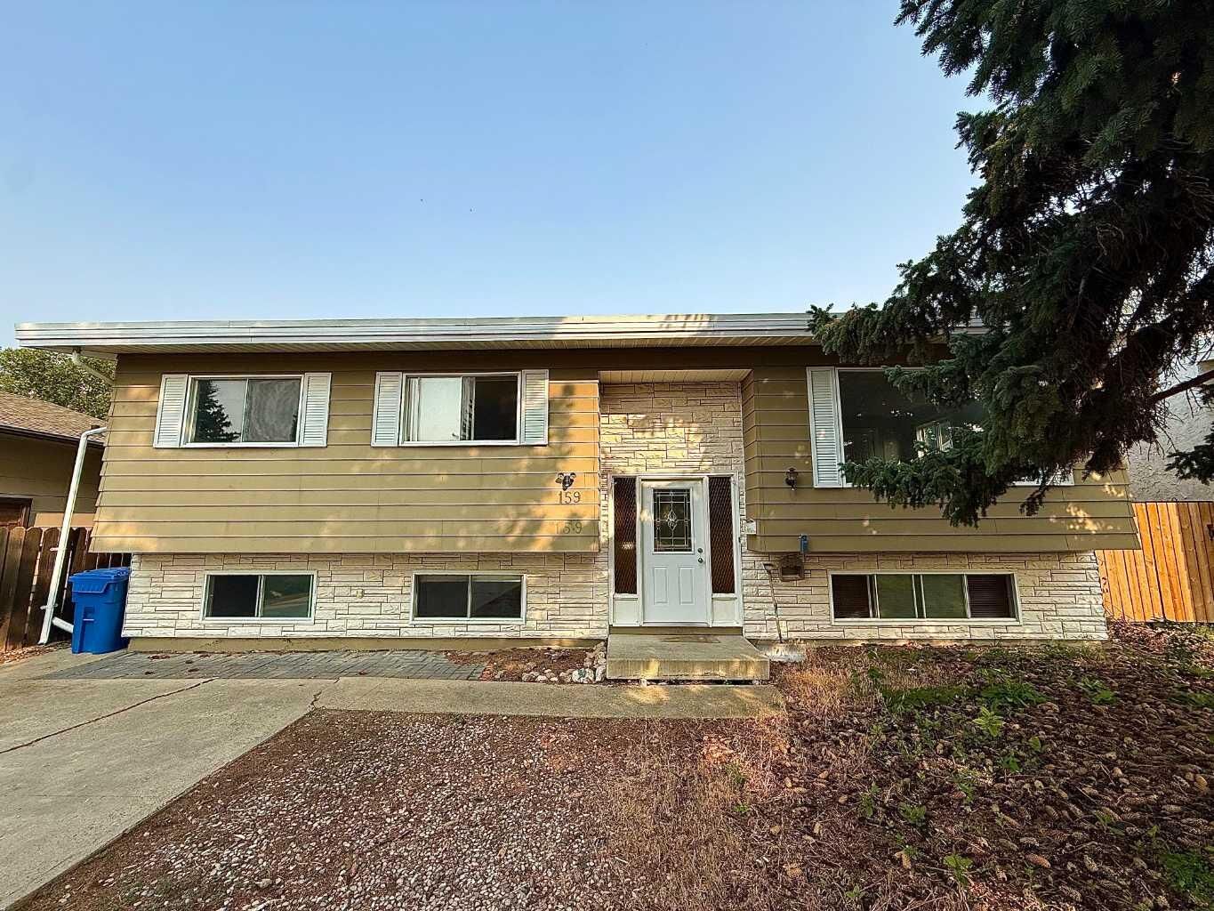 Property Photo: 159 Laval Boulevard W AB T1K 4G7